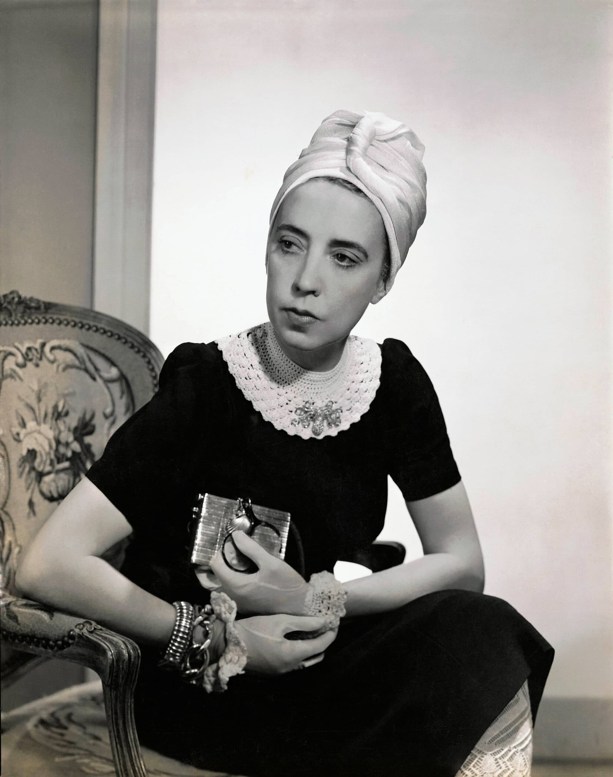 2026 Moda Sergileri Designer Elsa Schiaparelli Wearing Black Silk Dress With Crocheted Collar Of Her Own Design And A Turban Photograph By Fredrich Baker Vogue